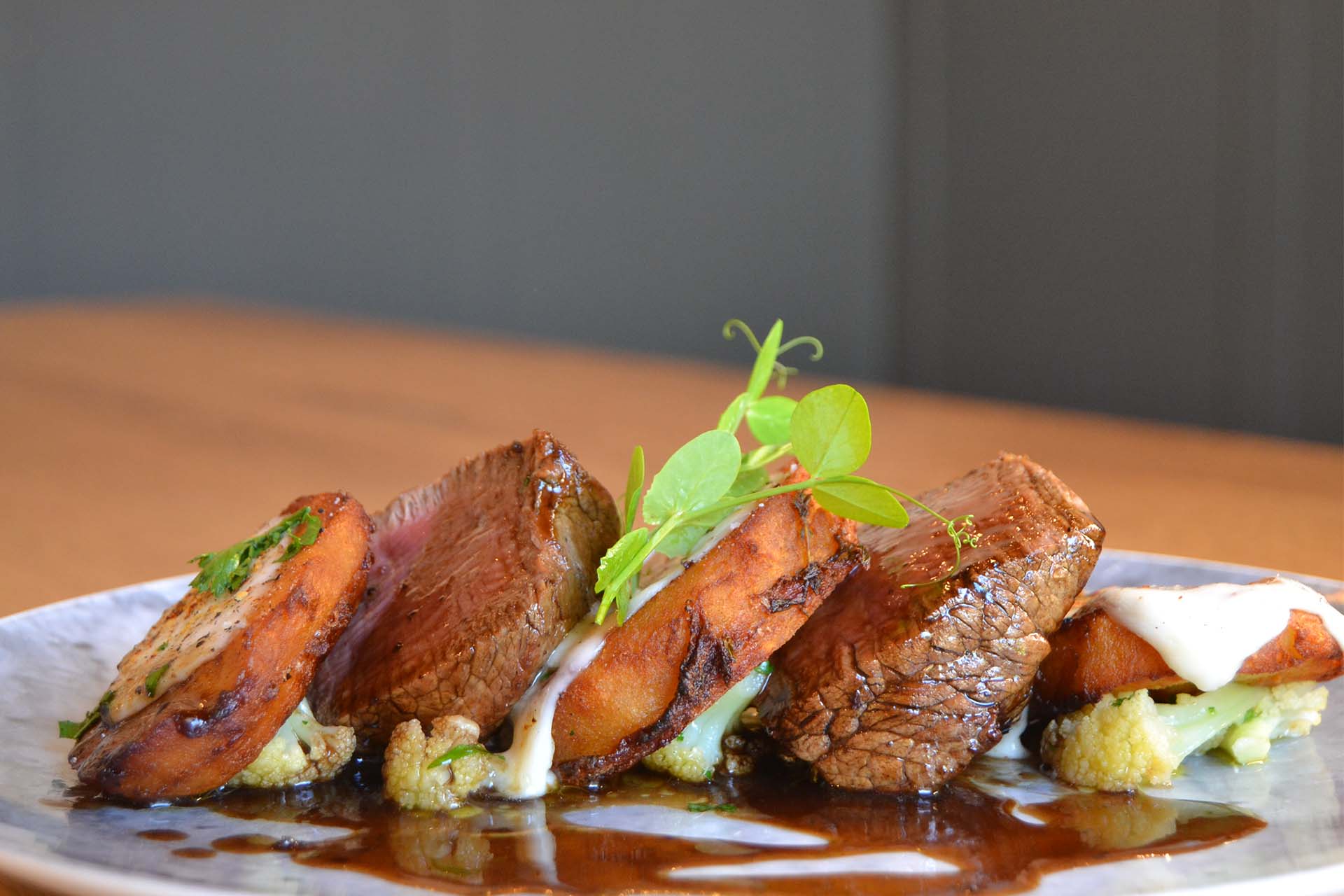 beef medallions with roast potatoes covered in fondant to serve as a main dish for food and wine pairing experience