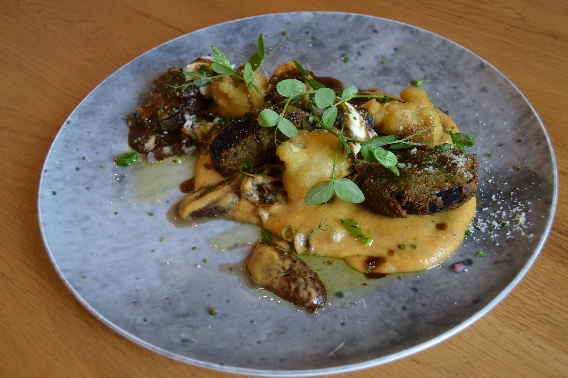 vegetarian dish consisting of truffle and cauliflower aubergine that makes a good food and wine pairing with chardonnay for the winter