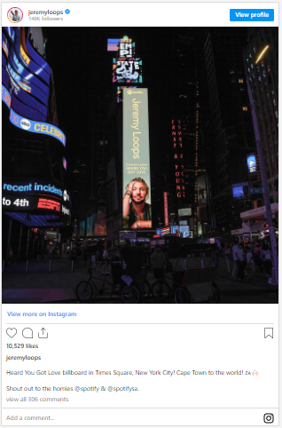 a billboard of Jeremy loops in New York Times Square to promote his concert in the United States and the world